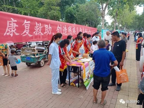 图为商丘市残联组织开展第四次全国残疾预防日活动现场4